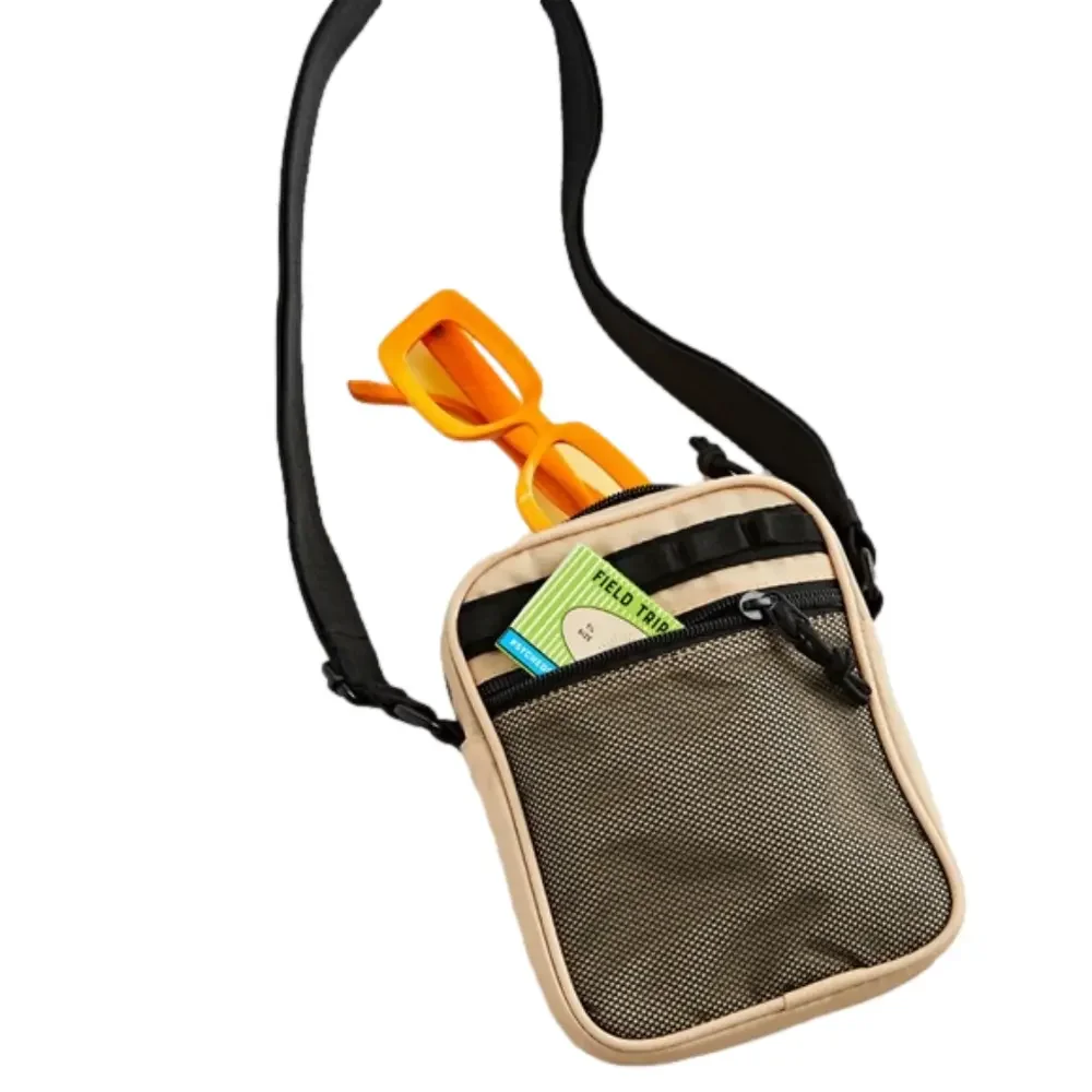 NWT Urban Outfitters Ripstop Utility Sling Bag in Tan